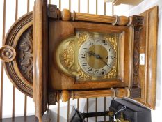 Early 20th century German bracket clock, the brass dial with silvered chapter ring,
