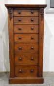 Victorian walnut seven-drawer Wellington chest on plinth base