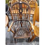 19th century elm and beech high back Windsor chair with pierced splats, solid seat,