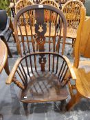 19th century elm and beech high back Windsor chair with pierced splats, solid seat,