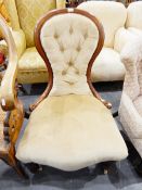 Victorian spoonback chair with buttoned upholstery,