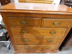 Late Victorian chest of drawers with two short and three long graduated drawers,
