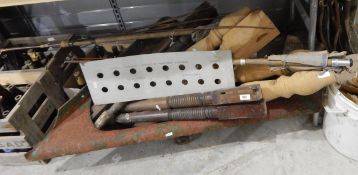 Assorted tools, fishing rods, turned table legs, etc.