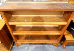 Two stained wood bookcases