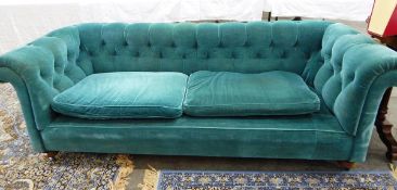 Chesterfield button upholstered settee upholstered in a turquoise blue dralon-type fabric