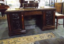 19th century continental carved oak kneehole desk, fitted a drawer to concave kneehole,