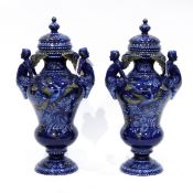 Pair of French faience 'A Montagnon' vases and covers of renaissance style, baluster form,