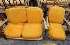 Ercol stickback two-seater settee and an armchair to match (2)