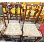 Pair of Edwardian mahogany occasional chairs with pierced latticework splat backs,