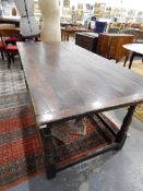 Oak refectory-style dining table on turned supports and straight stretchers,