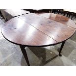 18th century mahogany drop-leaf oval-top gateleg table on turned tapering legs with pad feet,