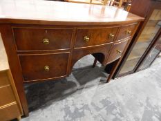 Georgian-style bow front yew veneer sideboard, the top with boxwood stringing,