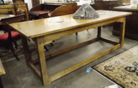 Oak refectory style dining table of rectangular form, on chamfered square legs,