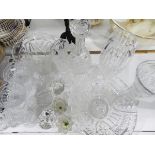 Quantity of cut glass including vases, decanter, fruit bowl, finger bowls, candlesticks, etc.