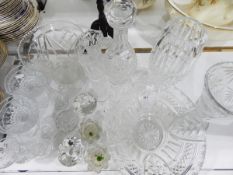 Quantity of cut glass including vases, decanter, fruit bowl, finger bowls, candlesticks, etc.