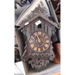 Camerer Kuss & Co cuckoo clock with ornate scroll top and pierced base (damaged)