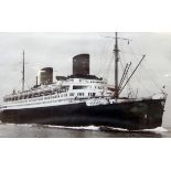 Framed photograph of a two-funnel steam ship,