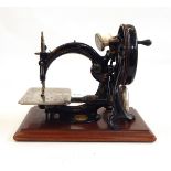 Wilcox & Gibbs automatic silent sewing machine within its original case,
