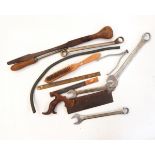 Collection of spanners and tools together with a wooden table-top cabinet with drawers