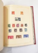 Two red stamp albums and contents of Worldwide mint and used stamps, mainly 1900 to 1950's,