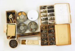 Quantity of screws, watch and clock parts, brass cogs,