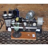 Pultra watchmaker's lathe, a Mercer watchmaker's tool with gauge,