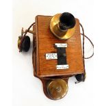 Wall-mounted Ericsson Railway telephone in oak case,