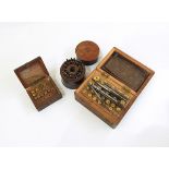 Two wooden cased sets of small brass circular watchmaker's drills and a wooden case of small drill