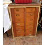 Collector's chest of two rows of seven short drawers