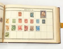 Vintage Lincoln album containing approximately 250 pages of mixed world stamps (some remaindering,