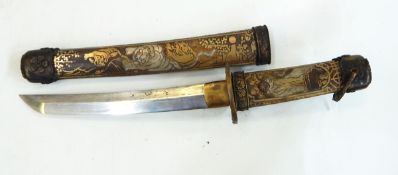 Japanese short sword, the metal hilt and scabbard decorated with tigers,