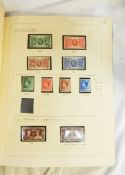 Green stamp album and contents of GB stamps,