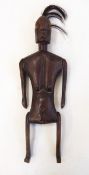 Carved hardwood articulated tribal figure, possibility an Indonesian fertility doll,