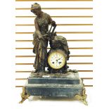 19th century French mantel clock with spelter figure, raised on a platform base, with splayed legs,