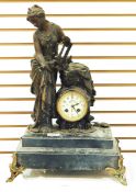 19th century French mantel clock with spelter figure, raised on a platform base, with splayed legs,