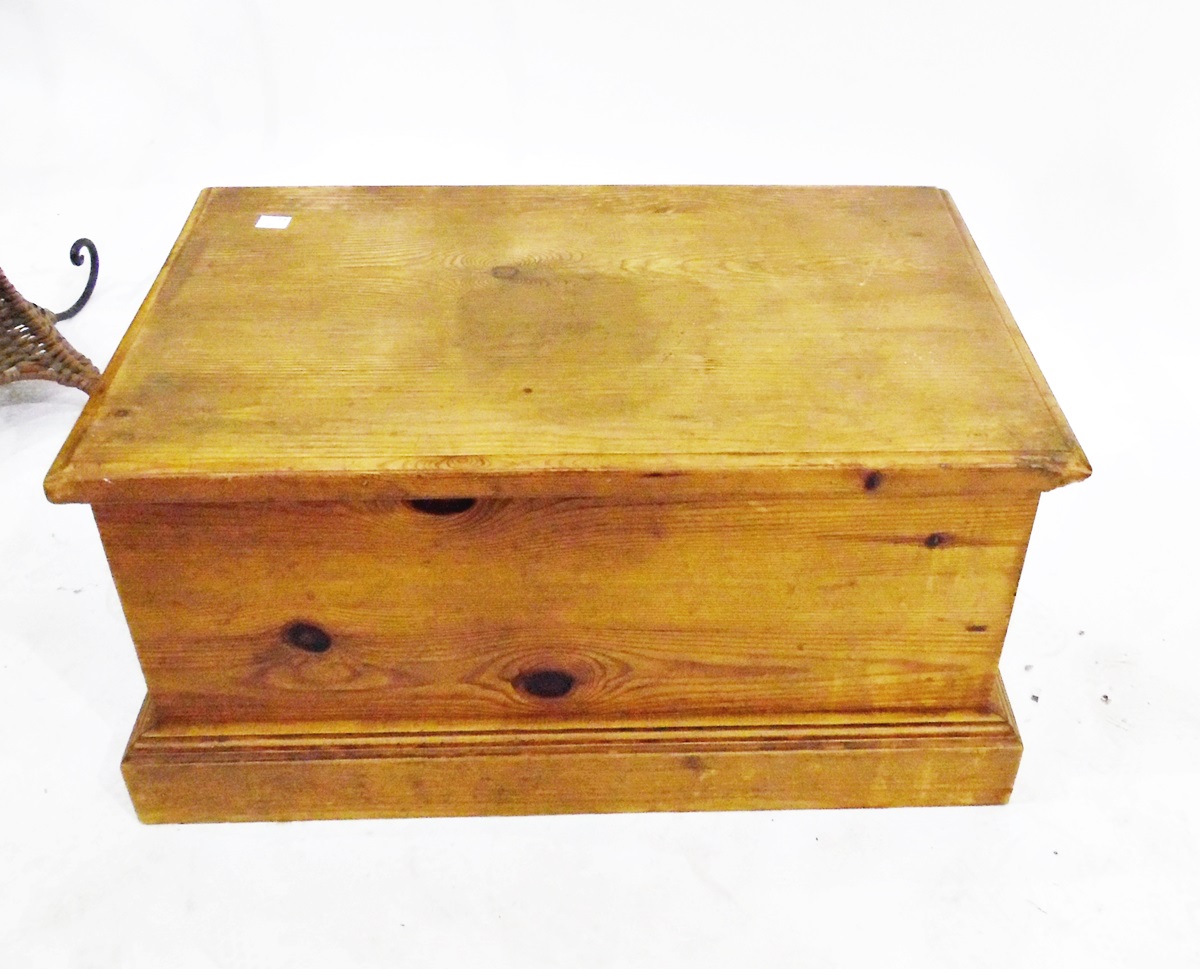 Small pine blanket box raised on a plinth base,