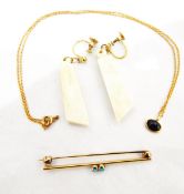 Gold-coloured metal and turquoise bar brooch set two small turquoise,