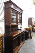 19th century Continental carved oak dresser, with lunette carved frieze,