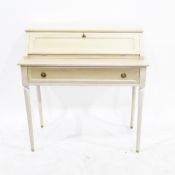 Modern rectangular top side table with long frieze drawer on turned tapering fluted legs,