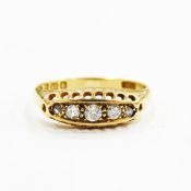 George V 18ct gold and diamond ring set five graduated stones with pierced setting, Chester 1913,