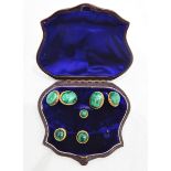 Gold and malachite cufflink and stud set comprising a pair of cufflinks with figure-of-eight links,