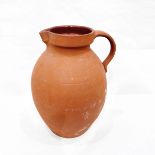 Royal Barumware - C H Brannam Limited large terracotta jug of bulbous form,