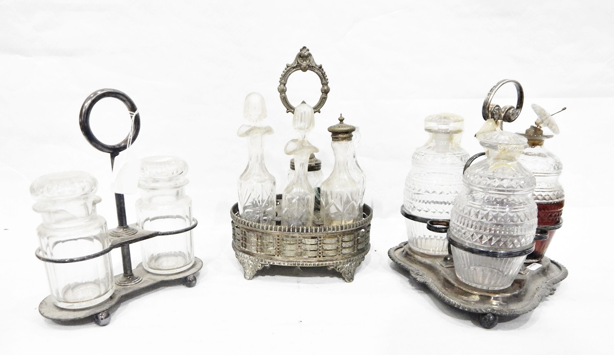 Silver plated decanter stand fitted with three cut glass decanters,