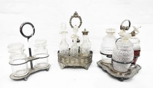 Silver plated decanter stand fitted with three cut glass decanters,