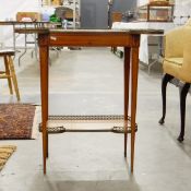 Louis XVI-style kingwood writing table with brass gallery surround, hinged writing panel,