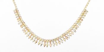 Italian three-coloured gold fringe necklace, the clasp marked 375, approx.