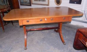 Reproduction mahogany sofa table fitted with a single drawer, on two splayed feet,