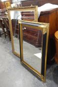 Rectangular mirror in gilt painted moulded frame,