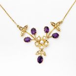 Victorian 15ct gold, amethyst and pearl pendant on chain, having central flowerhead set with pearls,