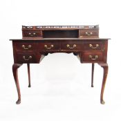 Georgian style mahogany writing desk, the back with pierced gallery surround and two small drawers,